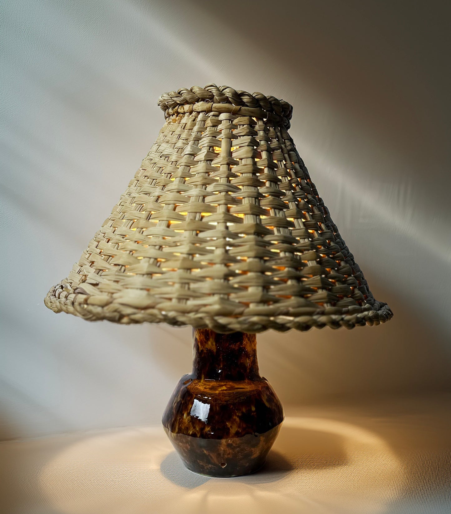 Mid-century ceramic lamp with wicker cap