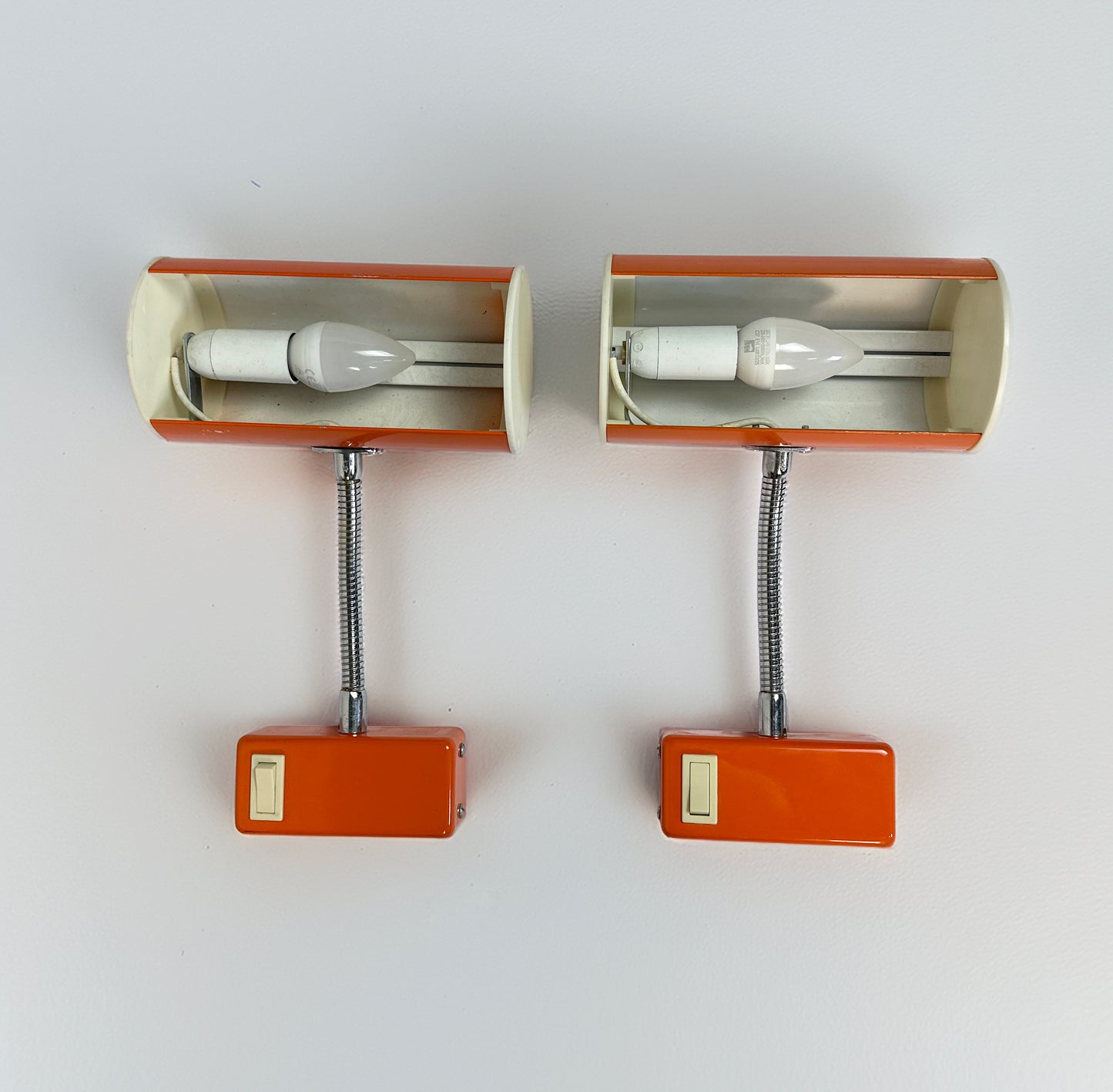 Pair of orange 1970s wall lamps from Ateljé Lyktan